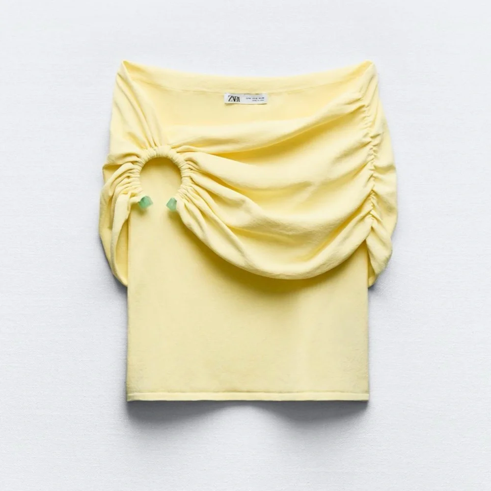 pastel yellow off the shoulder knit top with a blue stone buckle detail - Picture 3 of 4